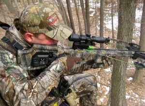 Crossbow Hunting Beginner stalking through woods